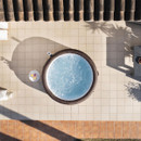 Top-down view of a filled Lay-Z-Spa Bali inflatable hot tub with gently bubbling water.