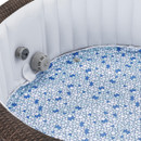 Close-up of the Lay-Z-Spa Bali interior showing the patterned floor and integrated water jets along the side wall.