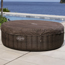 Lay-Z-Spa Bali inflatable hot tub with fitted insulating cover secured for heat retention.