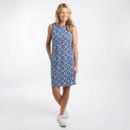 Model wearing a sleeveless blue and white printed shift dress with side pockets, standing pose