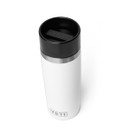 Angled top view of a white YETI Rambler 16 oz travel bottle with the black lid on, shown on a white background.