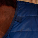 Close-up of navy quilted horse rug shoulder seam and binding