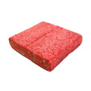 A single square berry suet block in bright red with visible seeds embedded throughout, shown on a white background.