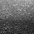 Close-up of water droplets on Blackstone griddle cover fabric showing weather-resistant material