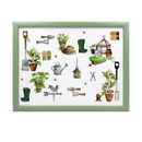 Green-framed garden-themed lap tray shown from above, featuring assorted illustrations including gardening tools, wellington boots, gloves, potted plants, a watering can, a greenhouse, tomatoes, books and small bees.