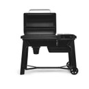 Traeger Woodridge pellet grill with lid open showing cooking grates