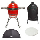 Red Kamado grill with black side shelves stands on wheels beside its black cover. Below are a ceramic pizza stone and a half-moon grill grate.