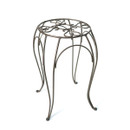 Brown metal plant stand with tall curved legs and decorative scrollwork top, shown on a white background.