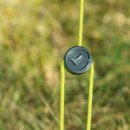 Close-up of adjustable tent guy line tensioner on bright green cord