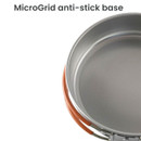 Close-up of MicroGrid anti-stick base on Easy Camp frying pan with textured cooking surface.