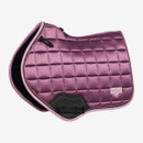 A luxurious purple saddle pad with a quilted pattern is shown. It features black accents and detailed stitching, exuding elegance and sophistication.