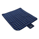 Blue and black tartan Regatta picnic blanket with integrated carry flap and logo, laid flat.