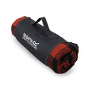 Regatta red and black picnic blanket rolled up with carry handle and logo flap.