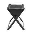 Black Regatta folding BBQ grill, side view showing X-frame stand and grill rack.