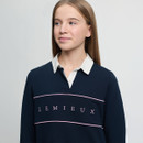 A young person with long hair wearing a navy shirt with a white collar featuring the text "LEMIEUX" in pink. They look to the side, smiling softly.