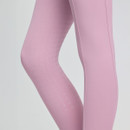 Close-up view of a pink fabric with subtle floral texture on leggings. Smooth and stylish, evoking an elegant, modern, and delicate tone.