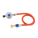 Gas regulator with round silver control unit and black adjustment knob, attached to a bright orange flexible hose with brass fittings and a blue quick-release connector, shown on a plain background.