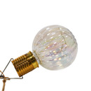 Side view of clear iridescent solar LED ball light with internal LED wire.