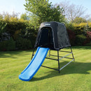 Hedstrom garden play tower with blue slide and weatherproof fabric tent canopy set up on a grassy lawn.