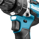 Makita cordless drill LED work light illuminating drilling area near trigger.