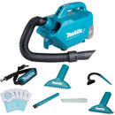 Makita cordless portable vacuum kit with hose, nozzles, brush tool, shoulder strap and replacement dust bags.