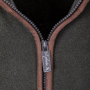Close-up of the front zip with branded pull tab and contrast trim.
