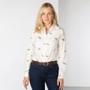 Front view of the model wearing the cream pheasant print shirt tucked into dark jeans with a brown belt.