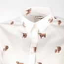 Close-up of the collar and upper front showing detailed Highland cow print and button placket.