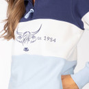 Close-up of the chest showing the Highland cow graphic and “Est. 1954” detail on the colour-block sweatshirt.