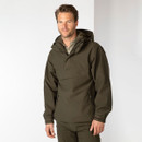 Front view of a model wearing a dark olive shooting smock with hood, front flap pocket and side zip pockets.