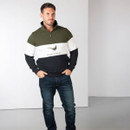 Men’s quarter-zip countrywear sweatshirt worn with jeans, shown full length on a model with hands in pockets.