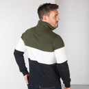 Rear view of the men’s colour-block sweatshirt on a model, showing the olive green upper panel, white mid-section and navy lower section.
