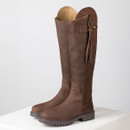 Women’s antique tan leather knee-high country boots with side zip and tassel detail, front angled view.