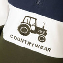 Close-up of sweatshirt showing embroidered tractor graphic and “Countrywear” text on white panel.