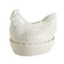 Glossy white ceramic hen egg storage container with basket base isolated on white background, decorative farmhouse kitchen accessory