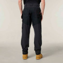 Rear view of black work trousers with reinforced panels and functional pocket design.