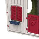 Close-up of playhouse front with red window shutters, small planter box and red door detail