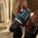 Detailed view of cordless drill grip and trigger area with LED battery status lights, showcasing ergonomic handle, modern design, and rechargeable battery system.