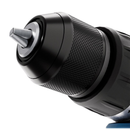 Macro close-up of metal drill chuck and bit holder, showing textured knurled grip for secure tightening and precision drilling performance.