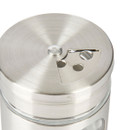 Close-up of spice jar lid showing adjustable shaker holes.