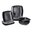 Full matt black square dinner set displayed with stacked plates and bowls in a studio setting.