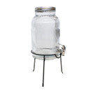 Angled view of a clear ribbed glass drinks dispenser on a black metal stand with chrome tap.