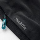 Close-up of Makita logo and zip pull detail on black work trousers