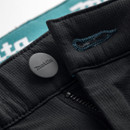 Close-up of waistband with Makita branded button, belt loop and zip fastening detail