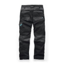 Rear view of black Makita work trousers showing back pockets, belt loops and durable panel construction