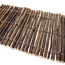 Angled close-up of flexible willow garden border edging secured with galvanised wire