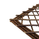 Close-up of handcrafted willow lattice trellis corner showing woven wooden frame and rustic natural finish