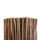 Close-up of natural willow fence screening poles secured with galvanised wire for rustic outdoor screening