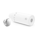 White SMEG 500ml stainless steel bottle shown lying on its side with the silver screw-top lid removed beside it.