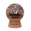 Freestanding steel fire globe with ornate dragon cut-out detailing and pedestal base, shown isolated on a plain background.